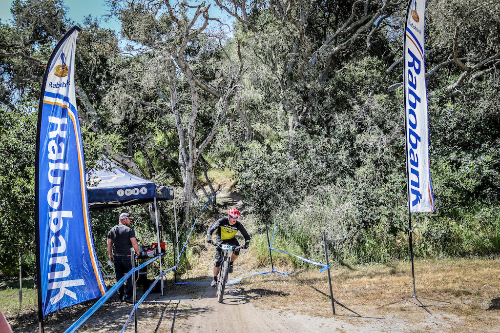 Rabobank once again sponsored the Rabobank KOM / QOM on Stage 2 this time. Their banners were flying high, reminding riders which stage paid the $100 for the top male and female rider in each category. Photo: Called to Creation.